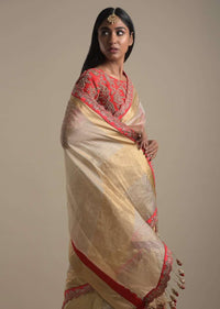 Gold Beige Saree In Zari Kota Silk With Red Scallop Border And Tassels On The Pallu Online - Kalki Fashion