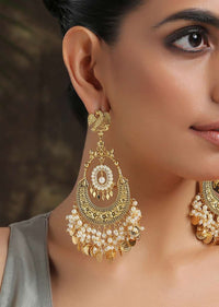Gold Chandbali Earrings Adorned In Rich Shell Pearls And Intricate Temple Detailing By Paisley Pop