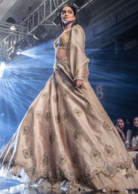 Sandcastle Tan Lehenga Choli With Hand Embroidered Buttis In Heritage Motifs Online - Kalki Fashion