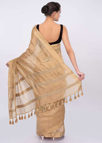 Gold linen saree with embroidered butti only on Kalki