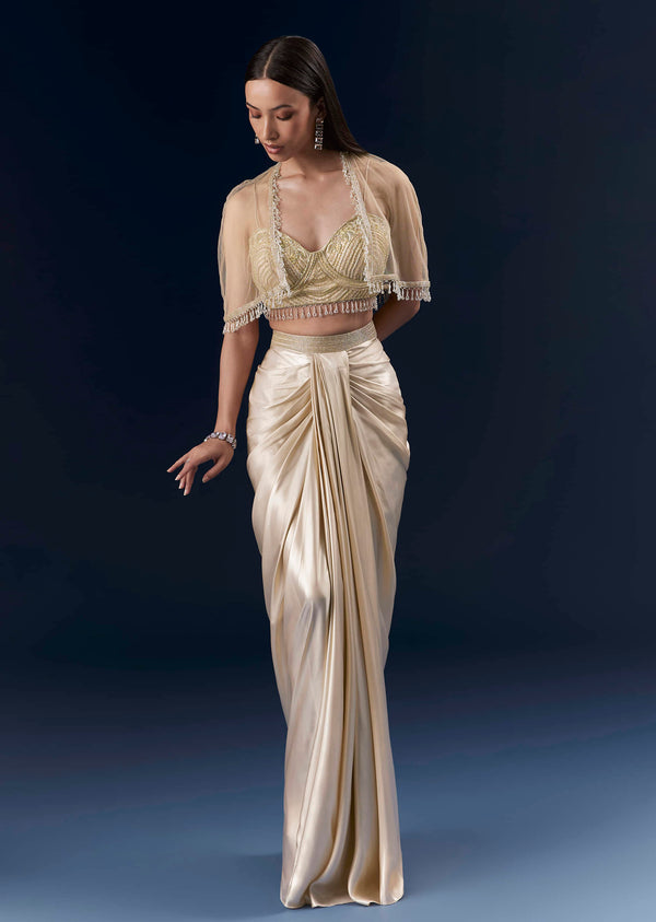 Gold Draped Skirt And Embroidered Crop Top With Net Cape