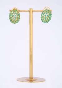 Gold plated earring adorn with jade green beads with cut work only on Kalki