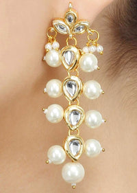 Gold Plated Earrings In A Long Sleek Design Embedded With Kundan And Pearls Online - Kalki Fashion