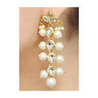 Gold Plated Earrings In A Long Sleek Design Embedded With Kundan And Pearls Online - Kalki Fashion