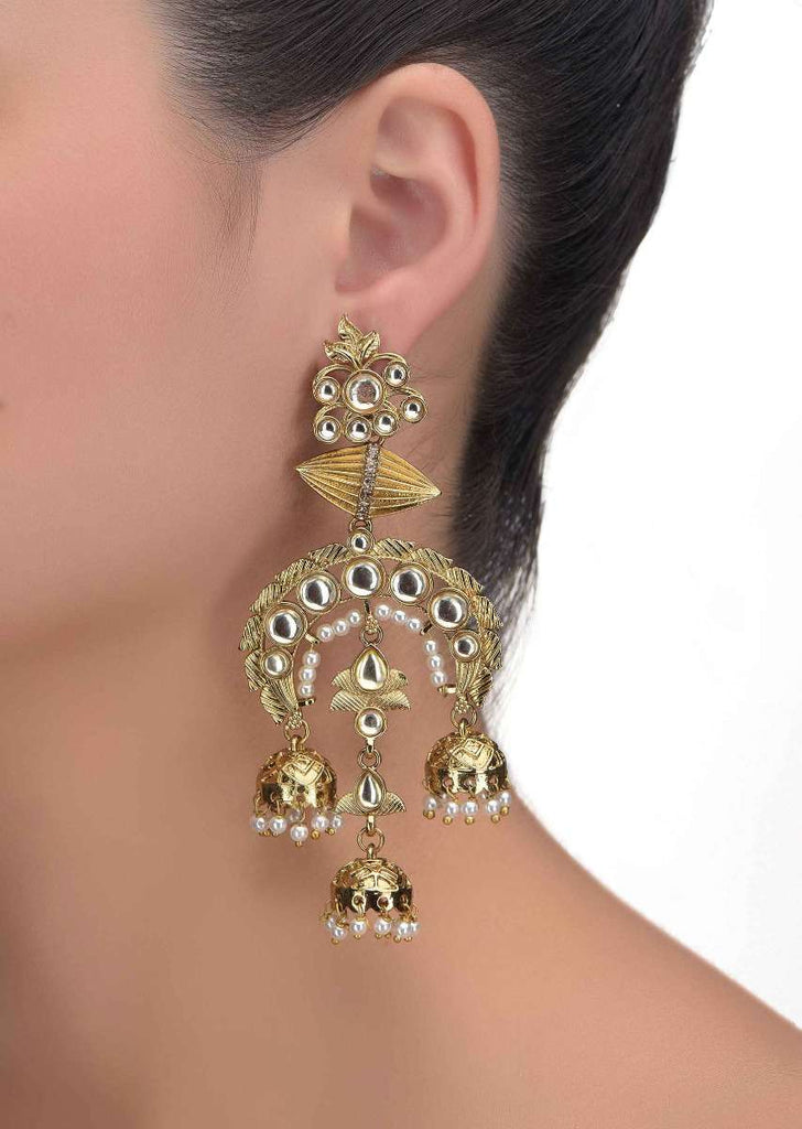 Gold plated earrings with three nano jhumkas studded with kundan, stones and pearls only on Kalki