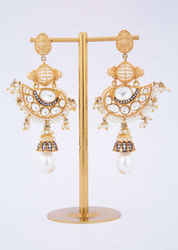 Gold plated fancy traditional earring adorn with kundan,moti stone and pearls only on Kalki