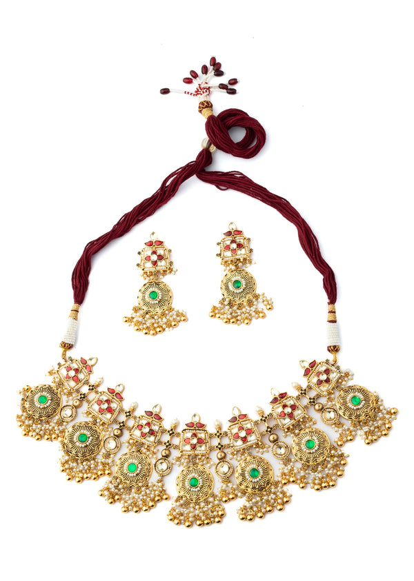 Gold Plated Green And Red Gemstones With Dangling Embellished Necklace Set With Earrings