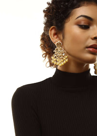 Gold Plated Kundan Earrings In Crescent Motifs With Dangling Yellow And White Pearl Fringes