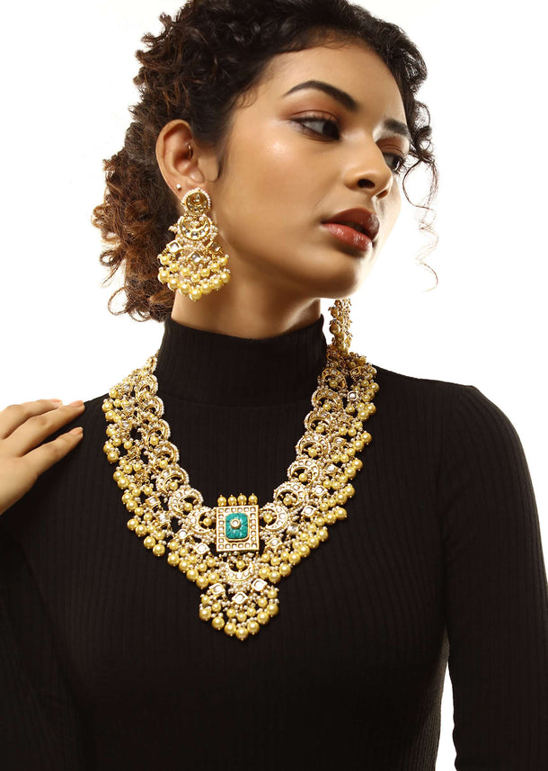 Gold Plated Kundan Necklace And Earrings Set With Green Carved Stone Pendant And Edged With Yellow And White Pearls