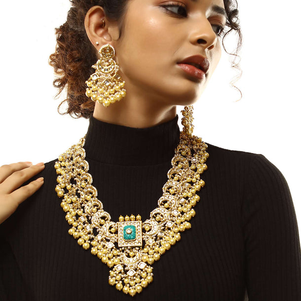 Gold Plated Kundan Necklace And Earrings Set With Green Carved Stone Pendant And Edged With Yellow And White Pearls