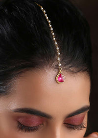 Gold Plated Maang Tika With Pink Drop Shaped Stone And Moti Embellished Chain