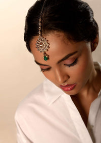 Gold Plated Mang Tika In Floral Motif With Semi Precious Crystals And Dangling Green Bead