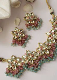 Gold Plated Necklace And Earrings Set With Kundan In Floral Motifs Along With Dangling Pink And Turquoise Beads By Paisley Pop