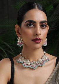 Gold Plated Necklace And Earrings Set With Kundan In Floral Motifs Along With Dangling Pink And Turquoise Beads By Paisley Pop