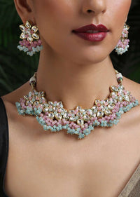 Gold Plated Necklace And Earrings Set With Kundan In Floral Motifs Along With Dangling Pink And Turquoise Beads By Paisley Pop