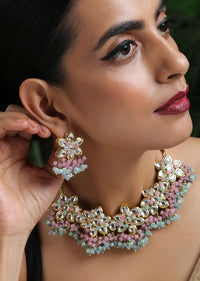 Gold Plated Necklace And Earrings Set With Kundan In Floral Motifs Along With Dangling Pink And Turquoise Beads By Paisley Pop