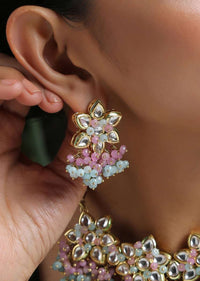 Gold Plated Necklace And Earrings Set With Kundan In Floral Motifs Along With Dangling Pink And Turquoise Beads By Paisley Pop