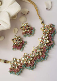 Gold Plated Necklace And Earrings Set With Kundan In Floral Motifs Along With Dangling Pink And Turquoise Beads By Paisley Pop