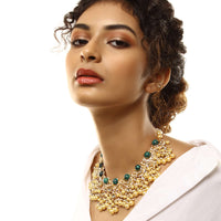 Gold Plated Necklace With Kundan Work In Crescent Shape With Green Semi Precious Spherical Stones And Pearl Fringes