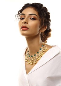 Gold Plated Necklace With Kundan Work In Crescent Shape With Green Semi Precious Spherical Stones And Pearl Fringes