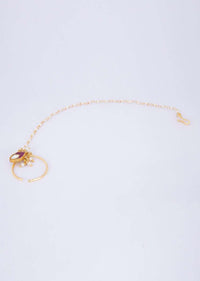 Gold plated nose ring with attached moti chain string only on Kalki