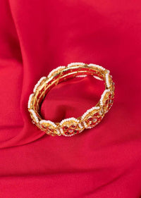 Gold plated traditional kada with red and white moti only on Kalki