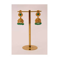 Gold plated uncut traditional jhumkas with emerald green beads