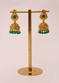 Gold plated uncut traditional jhumkas with emerald green beads