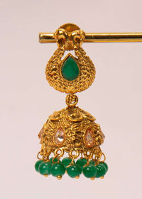 Gold plated uncut traditional jhumkas with emerald green beads