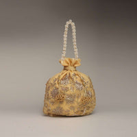Gold Potli Bag In Silk With Zardosi Embroidery In Floral Design