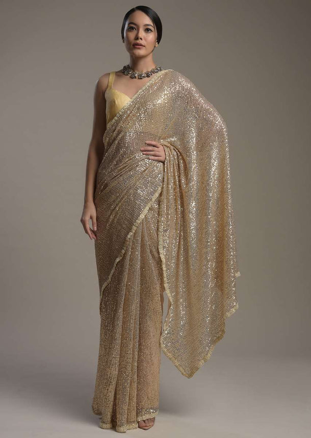 Gold Saree Embellished In Sequins With Moti Embroidered Border And Unstitched Blouse Online - Kalki Fashion