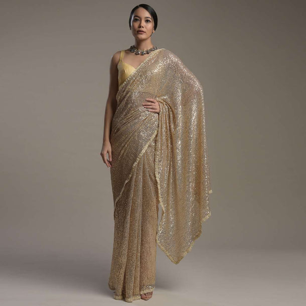 Gold Saree Embellished In Sequins With Moti Embroidered Border And Unstitched Blouse Online - Kalki Fashion