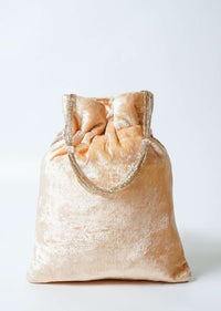 Gold And Silver Potli Bag In Velvet With Bead Fringes In Chevron Design Online - Kalki Fashion