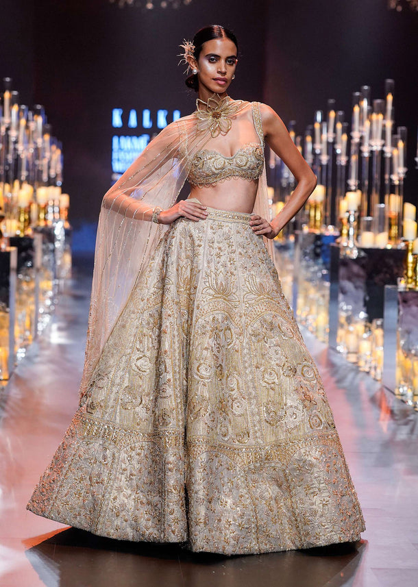 Gold Bridal Lehenga Set With Floral Motifs And Sequin Embroidery