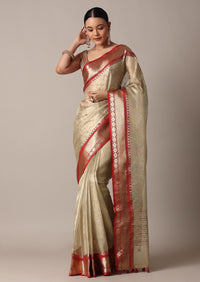 Gold Chanderi Kota Silk Woven Saree With Mirror Work And Unstitched Blouse Piece