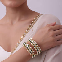 Gold Finish Kundan Bangles With Green Meenakari