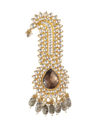 Gold Finish Kundan Kalgi In Mix Metal With A Light Brown Stone