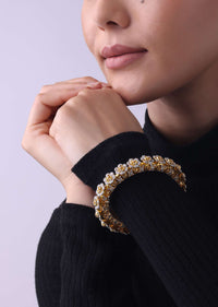 Gold Finish Openable Bangle Studded With Small Roses In Faux Diamonds