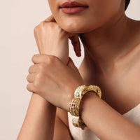 Gold Finish Rajwadi Bangle With Red Stones