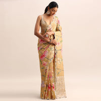 Gold Floral Printed Tissue Saree With Moti Work Border And Unstitched Blouse