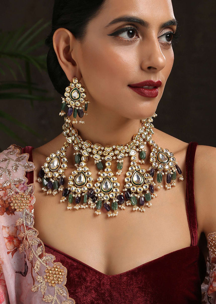 Gold Necklace Set With Intricate Floral Design Studded In Kundan And Green Stones By Paisley Pop