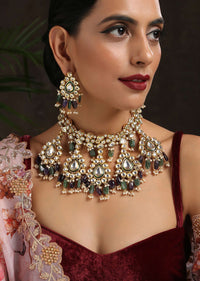 Gold Necklace Set With Intricate Floral Design Studded In Kundan And Green Stones By Paisley Pop