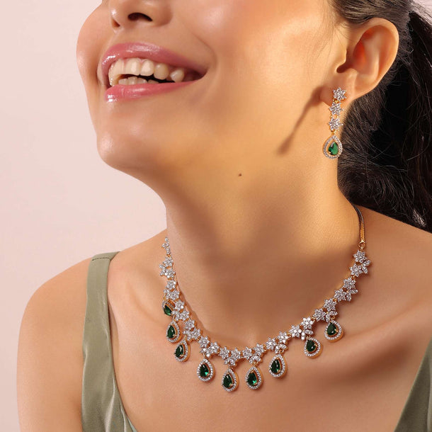 Gold Necklace With White & Green Stones In A Floral Design