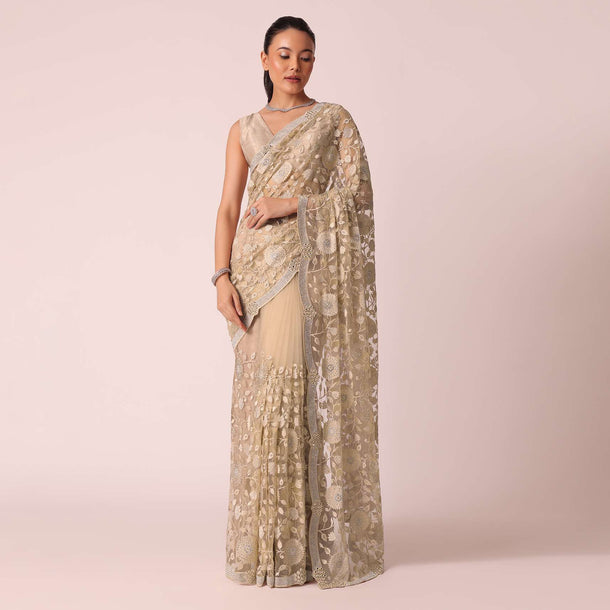 Gold Net Saree With Stone Studded And Florar work And Unstitched Blouse Piece