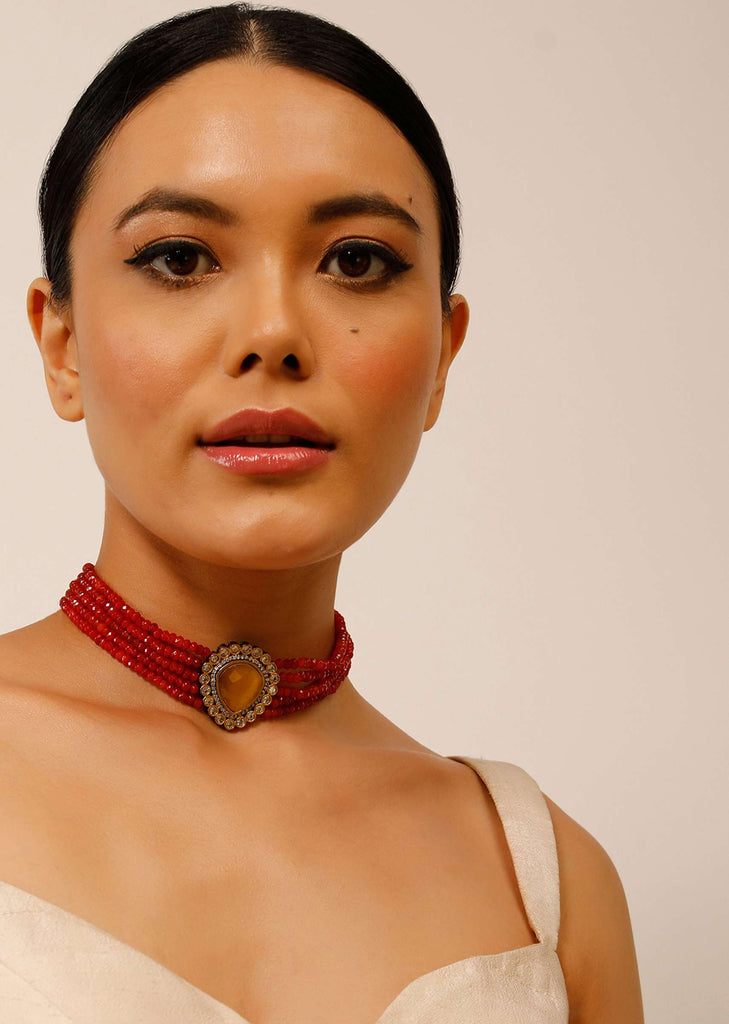 Gold Plated Choker Necklace With A Yellow Stone Centre And Coral Bead Strings