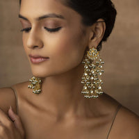 Gold Plated Kundan And Pearl Earrings With A Floral Motif