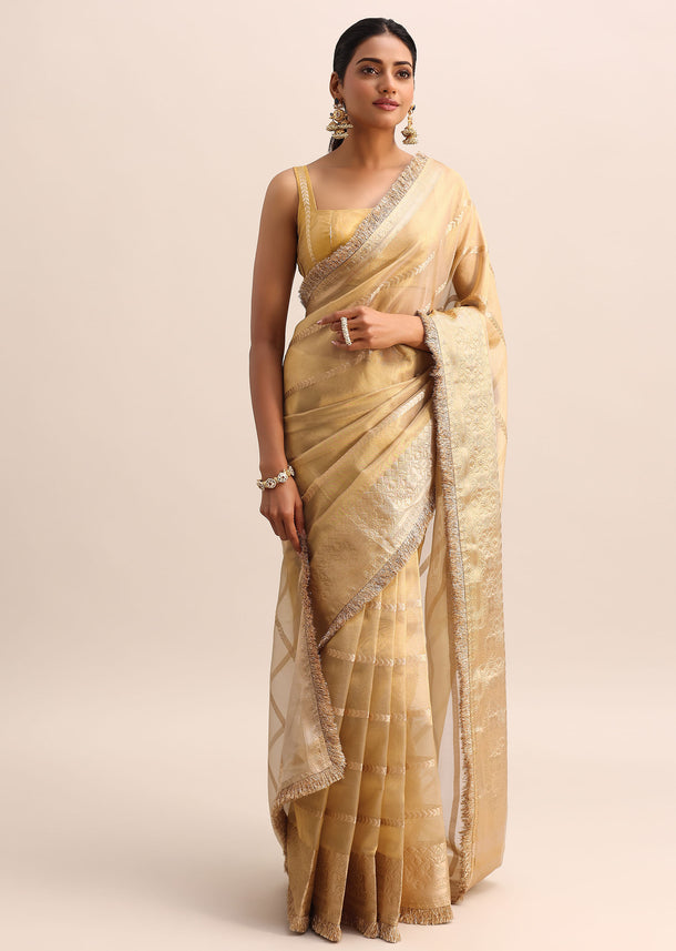 Gold Silk Saree With Zari Woven Border And Zari Frill With Unstitched Blouse