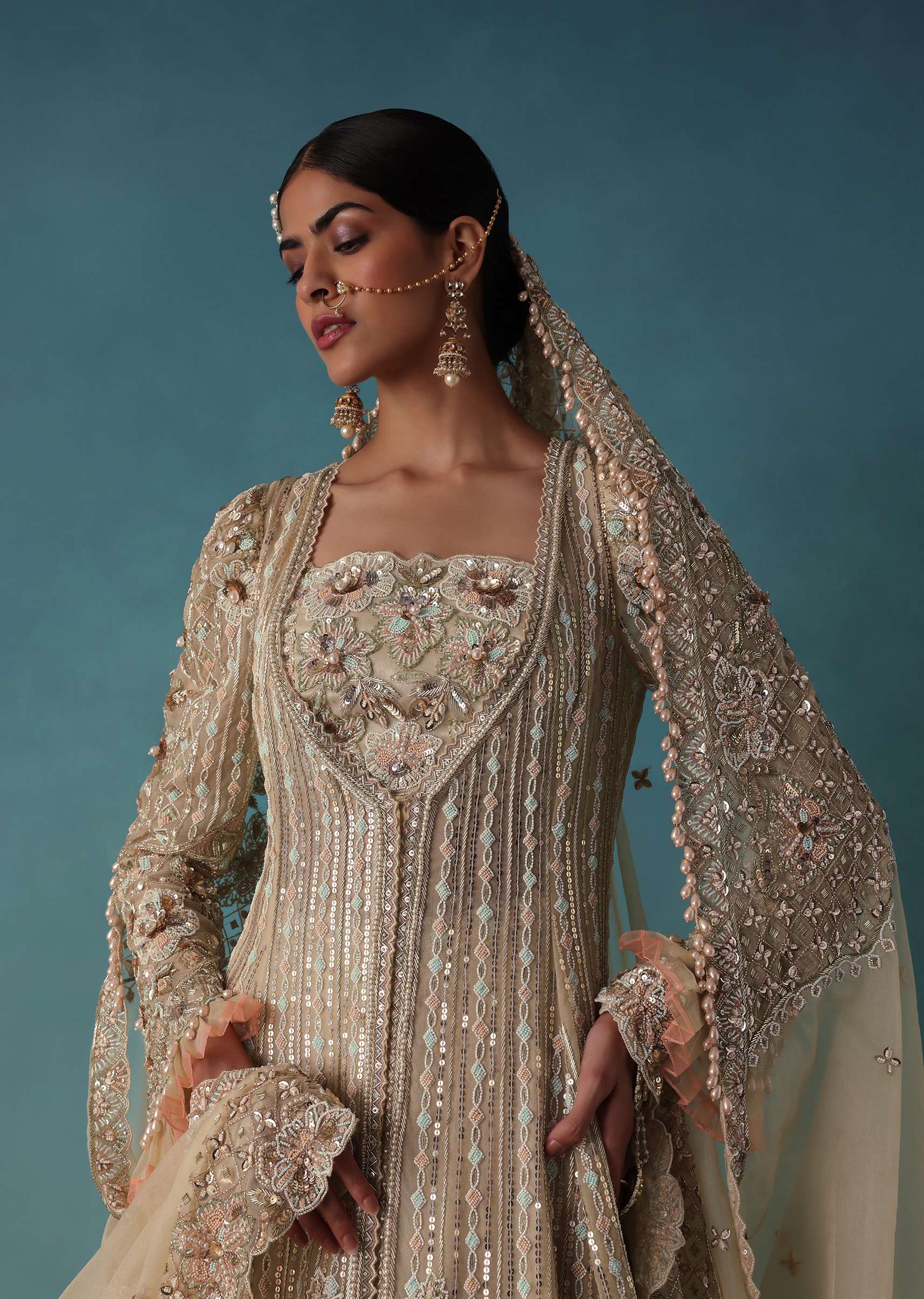 Gold Toned Embroidered Bridal Lehenga And Heavy Tube Top With Jacket