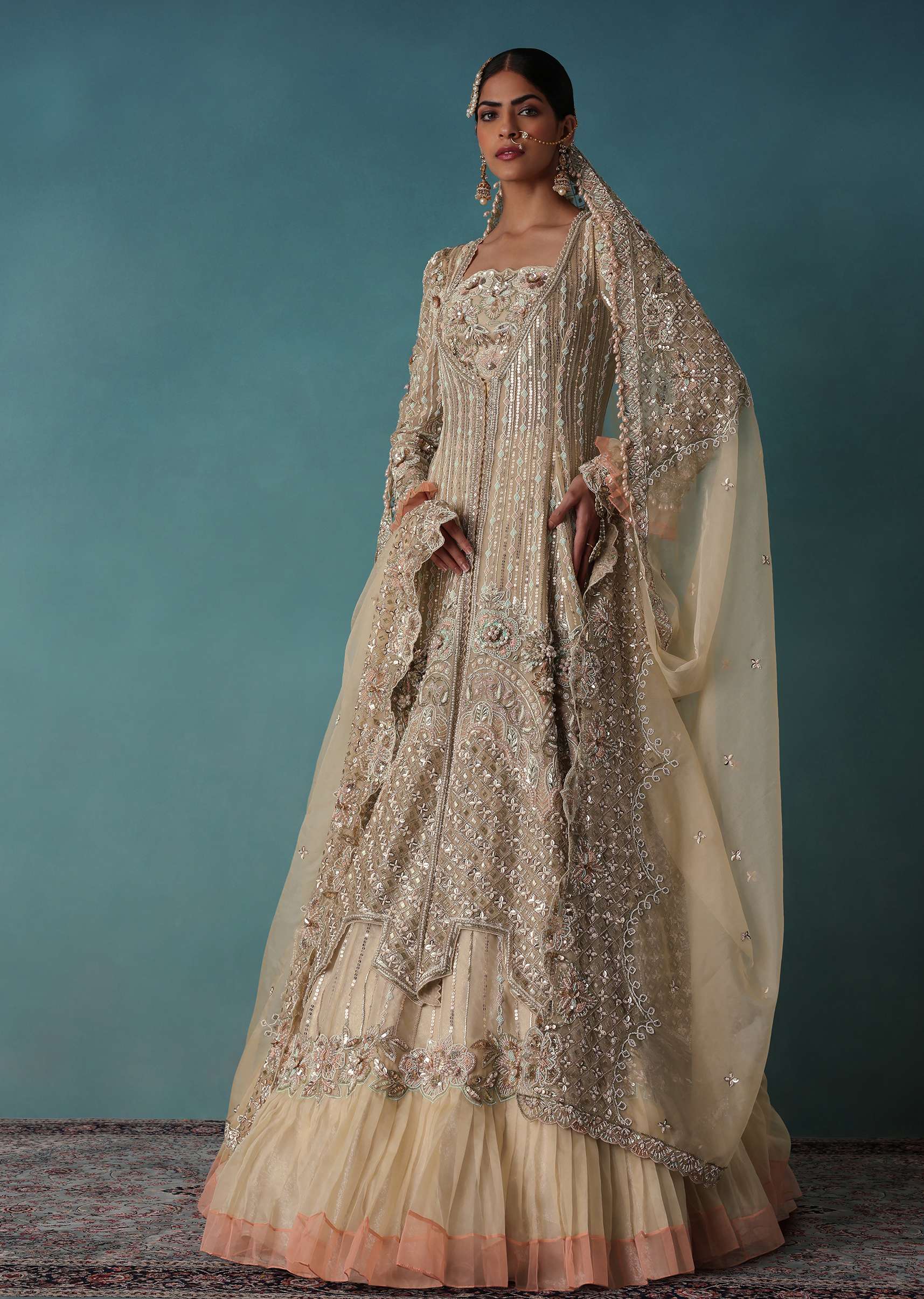 Gold Toned Embroidered Bridal Lehenga And Heavy Tube Top With Jacket