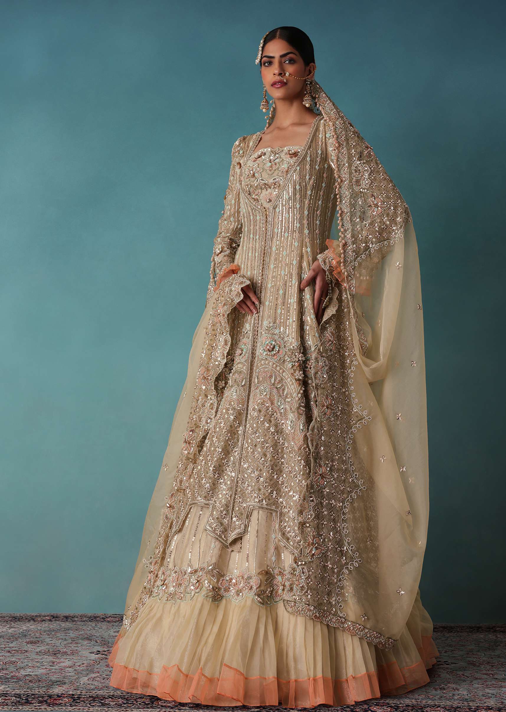 Gold Toned Embroidered Bridal Lehenga And Heavy Tube Top With Jacket